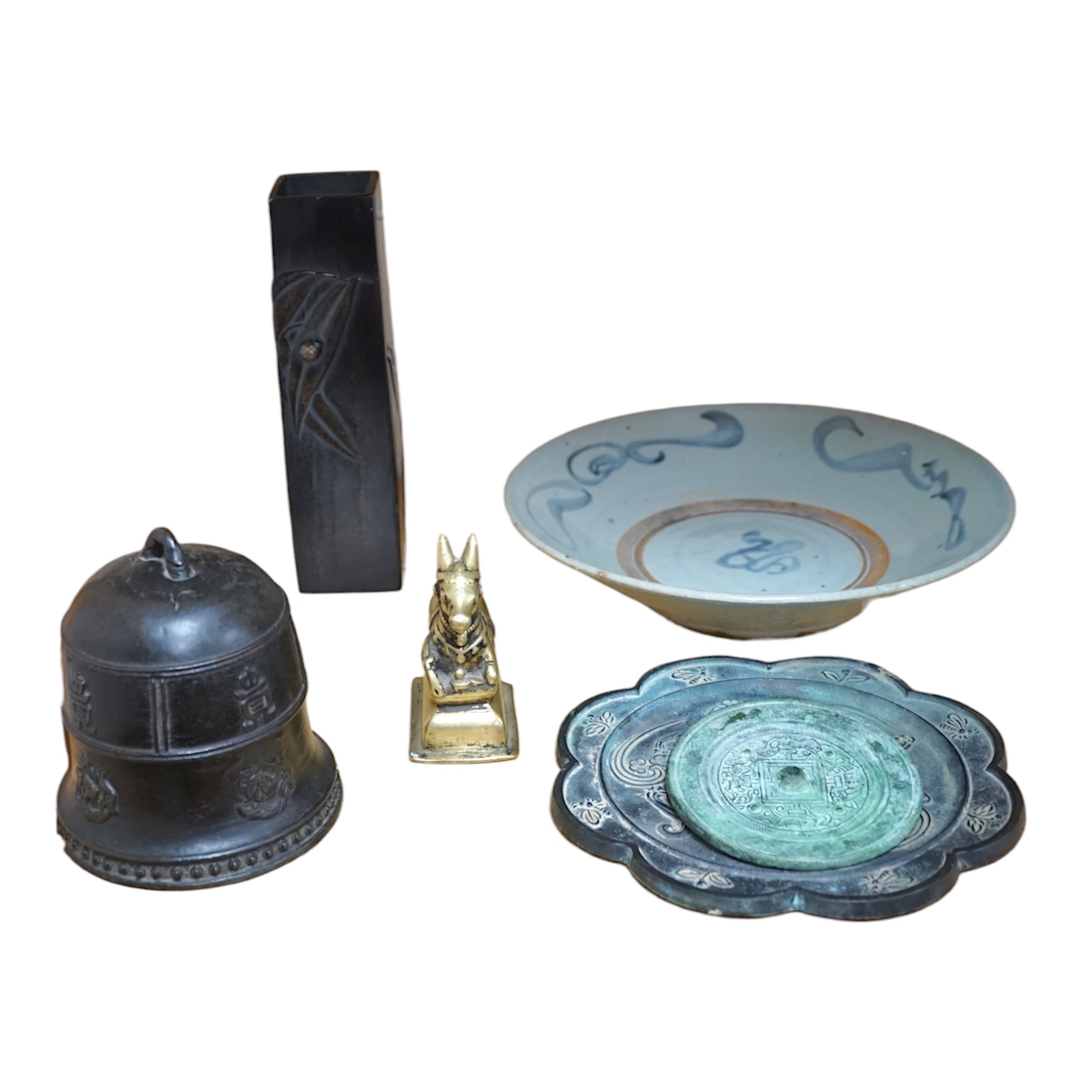 A Chinese archaistic bronze bell, two bronze mirrors, a bronze figure of Nandi, a kitchen Qing dish, and a Japanese antimony vase, largest 27cm in diameter. Condition - mostly fair